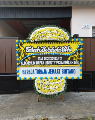 Papan Bunga Duka di Bewani